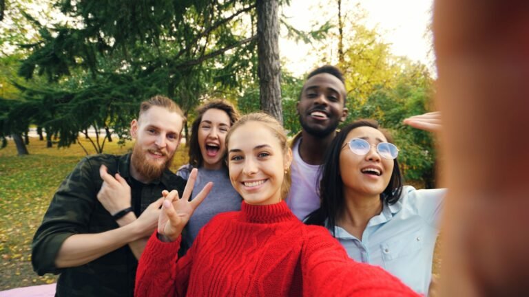 Group of friends taking a selfie at a party